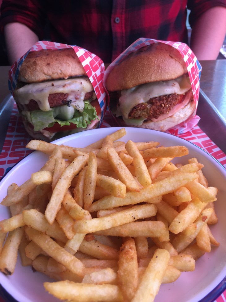 Two vegan burgers and a large portion of fries from Glut restaurant in Oxford