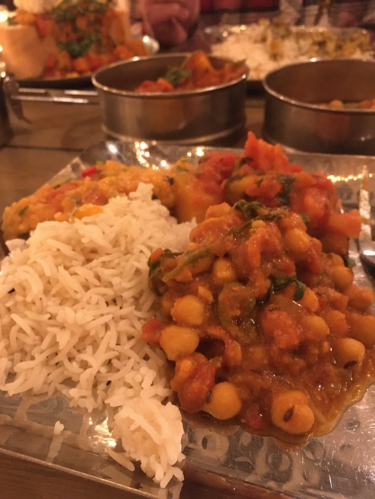 Selection of curries and basmati rice from Mowgli's Indian street food restaurant in Westgate, Oxford.