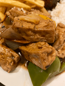 cubes of tofu in a brown sauce and green pepper from the First Floor restaurant in Oxford