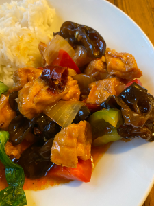 Stir fried mixture of tofu, dark red sundried chillis, green pepper and black mushrooms