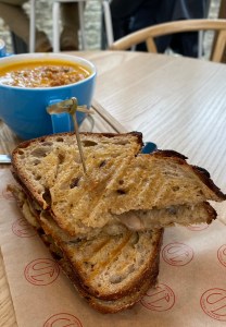 Toasted sandwich with mushroom peaking out
